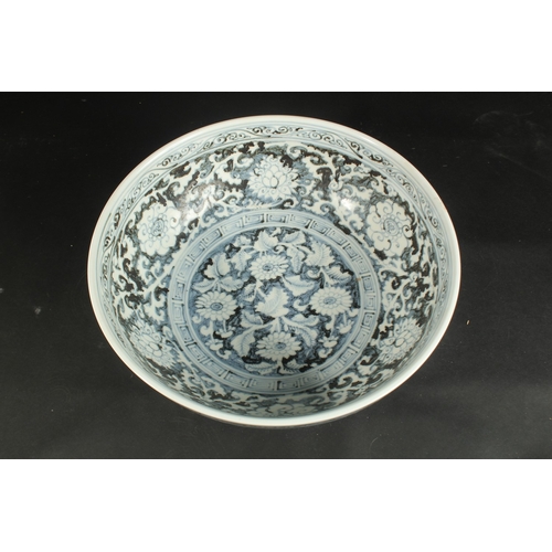 94 - A VERY LARGE CHINESE EXPORT / ISLAMIC MARKET BLUE AND WHITE PORCELAIN FLORAL BOWL, 41cm diameter.