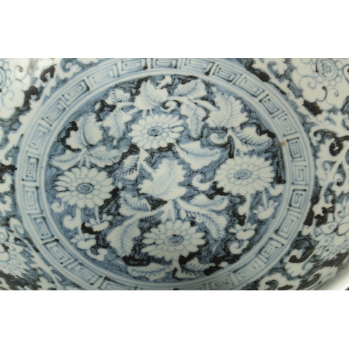 94 - A VERY LARGE CHINESE EXPORT / ISLAMIC MARKET BLUE AND WHITE PORCELAIN FLORAL BOWL, 41cm diameter.