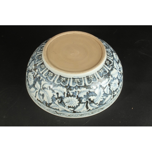 94 - A VERY LARGE CHINESE EXPORT / ISLAMIC MARKET BLUE AND WHITE PORCELAIN FLORAL BOWL, 41cm diameter.