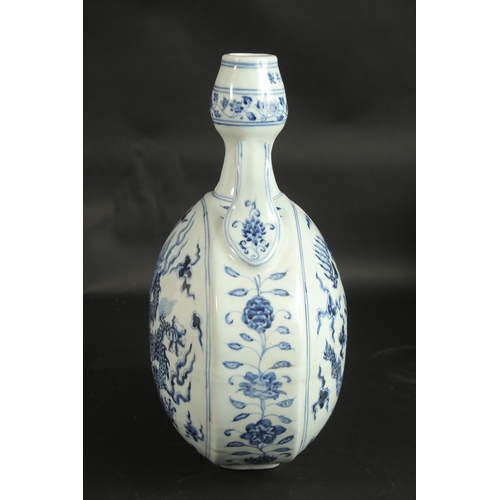 97 - A CHINESE BLUE AND WHITE PORCELAIN TWIN HANDLE DRAGON MOON FLASK, 32.5cm high.