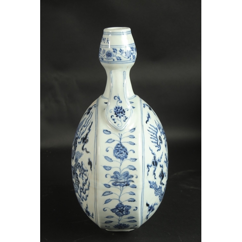 97 - A CHINESE BLUE AND WHITE PORCELAIN TWIN HANDLE DRAGON MOON FLASK, 32.5cm high.