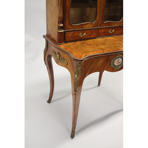 517 - A GOOD 19TH CENTURY KINGWOOD AND WALNUT BONHEUR-DU-JOUR, the serpentine shaped top with a pair of gl... 