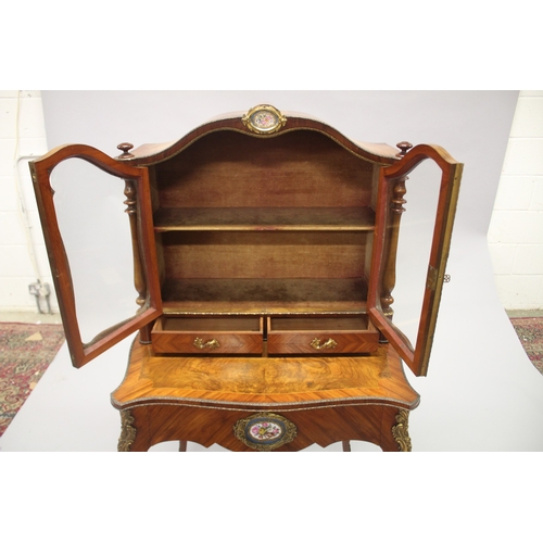 517 - A GOOD 19TH CENTURY KINGWOOD AND WALNUT BONHEUR-DU-JOUR, the serpentine shaped top with a pair of gl... 