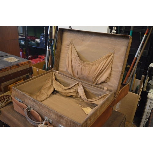 114 - A vanity case with outer canvas cover.