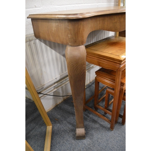 189 - A walnut console table with carved cabriole legs.