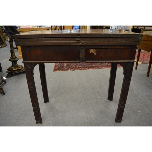 272 - A good Chippendale period mahogany rectangular fold-over combination tea and card table.