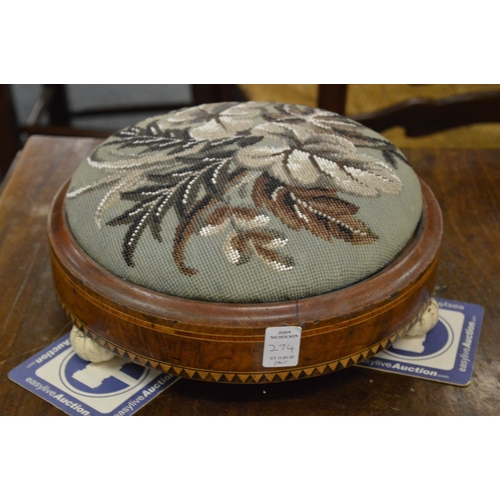 274 - A pair of Victorian inlaid walnut and bead work upholstered circular foot stools with porcelain feet... 