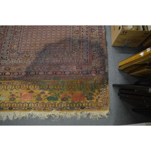 284 - Persian design rug with all over geometric design (stained) 200cm x 137cm.