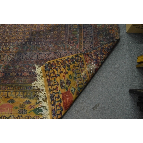 284 - Persian design rug with all over geometric design (stained) 200cm x 137cm.