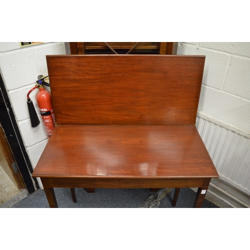 295 - A mahogany rectangular fold-over tea table.