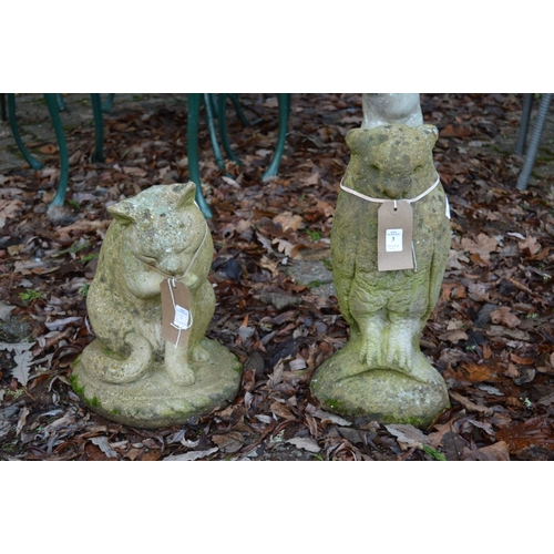 3 - Two reconstituted stone garden ornaments, one modelled as a owl the other a cat licking its paw.