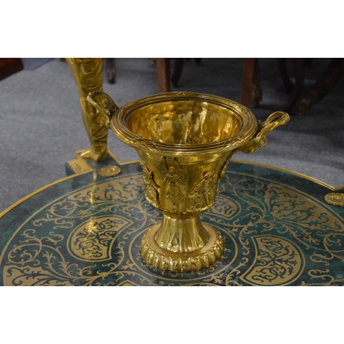 308 - An impressive faux malachite and ormolu circular two-tier centre table with figural supports.