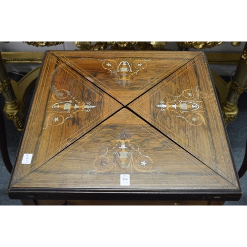 319 - A Victorian inlaid rosewood envelope card table.