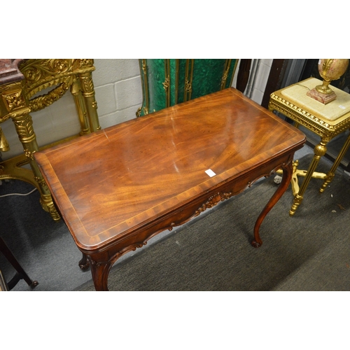 325 - A very good pair of mahogany card tables in the Georgian style, the folding rectangular tops having ... 