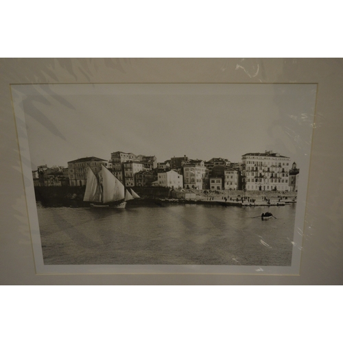 332 - A pair of black and white photographic prints.