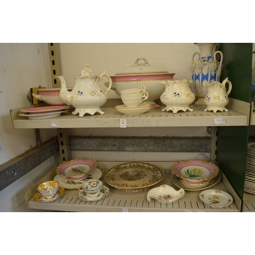 36 - A quantity of decorative china to include an armorial tureen and cover.