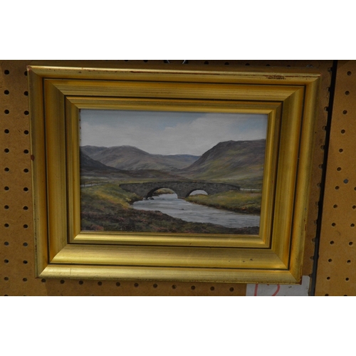 386 - Andrew Welch, mountainous river landscape with a stone bridge, oil on board.