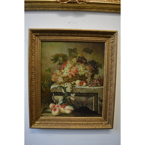 409 - W Cooper, still life of fruit, grapes and peaches in a basket on a ledge, oil on board, signed.