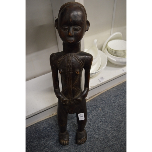 565 - A large African carved wood standing figure.