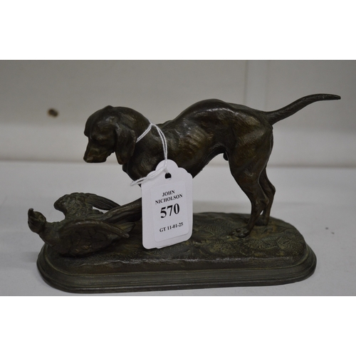 570 - In the manner of Mene, small cast spelter group of a dog and a pheasant.