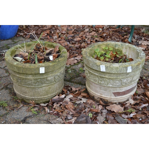 6 - A pair of reconstituted stone planters.