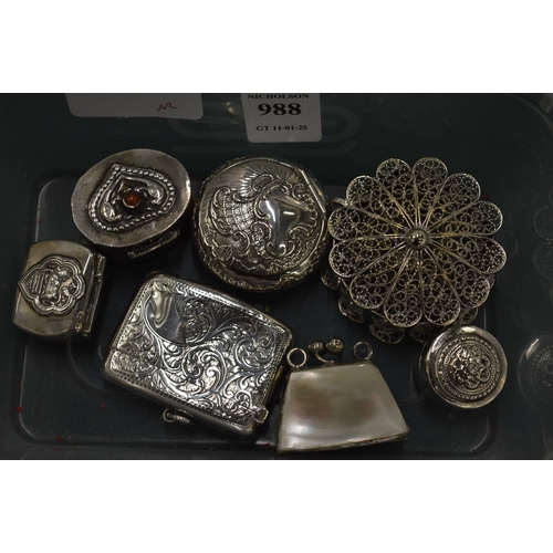 988 - A collection of silver pill boxes, vesta cases etc.