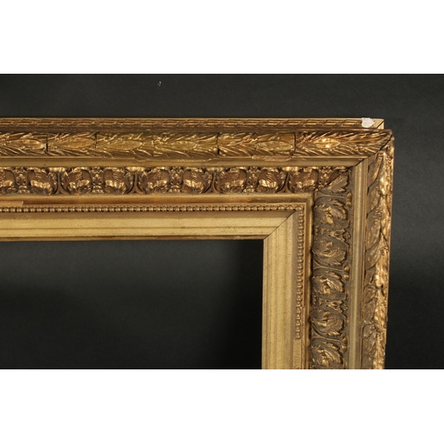 A FRENCH SLOPE 4.25INS GILTWOOD PICTURE FRAME. Rebate size 14.5ins X 24ins