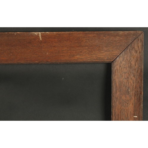 AN OAK VENEERED 3.25INS WIDE PICTURE FRAME Rebate size 21ins x 30ins.