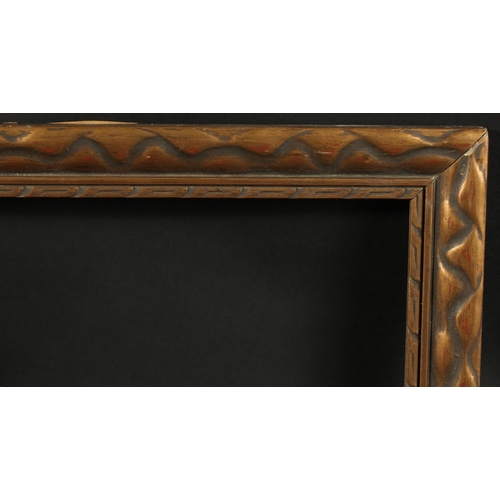 26 - AN ALL ROUND GILTWOOD PICTURE FRAME Rebate size 14Iins x 10ins.