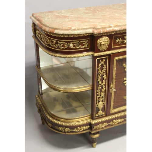 519 - A LARGE LOUIS XVITH DESIGN MARBLE TOP COMMODE fitted with four drawers, double panel doors and open ... 