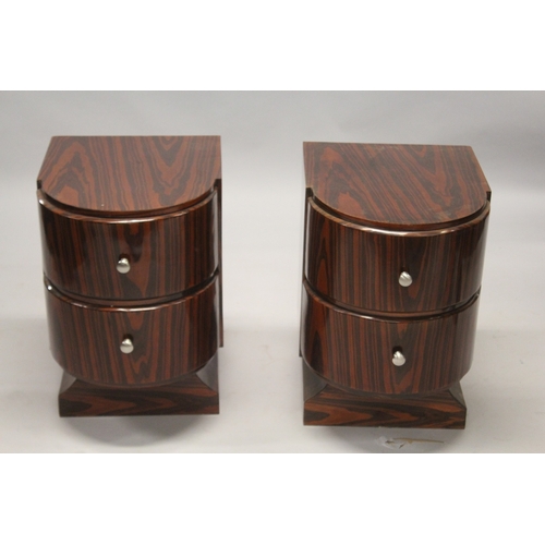 521 - A PAIR OF ART DECO SHAPED FRONT TWO DRAWER BEDSIDE CABINETS. 1ft 10ins high x 1ft 7ins wide.