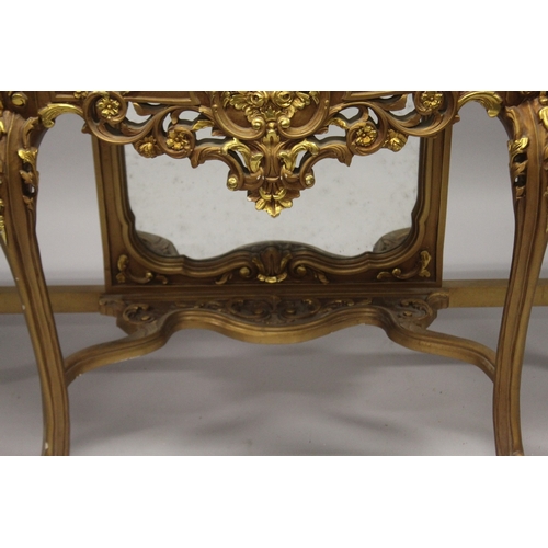 526 - A LOUIS XVITH GILDED MARBLE TOP CONSOLE AND MIRROR, the shaped base with marble top, scrolls and aca... 