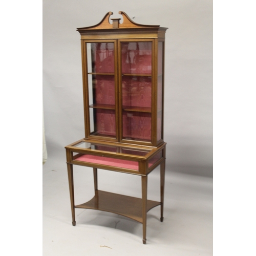 536 - AN EDWARDIAN MAHOGANY CHINA AND BIJOUTERIE CABINET, the top with glass panel doors, two glass shelve... 