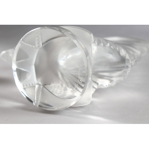 541 - A GOOD PAIR OF LALIQUE GLASS COCKERELS on circular bases. Engraved Lalique, France. 8.5ins high.