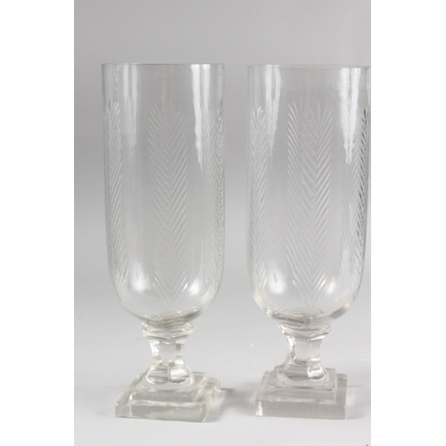 546 - A GOOD PAIR OF GLASS HURRICANE LAMPS. 13.5ins high.