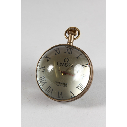 878 - A REPLICA OMEGA GLASS BALL WATCH. 2ins diameter.