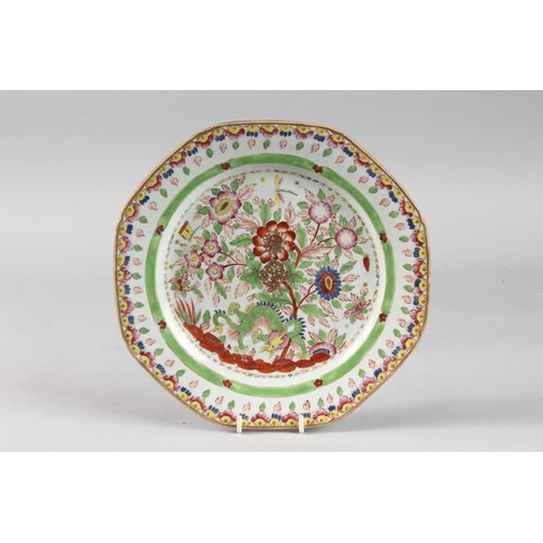 1 - A 19TH CENTURY CHINESE CLOBBERED PORCELAIN PLATE, painted with dragon and flora, 24.5cm wide.