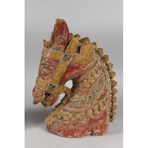 100 - A LARGE PAIR OF 19TH CENTURY SOUTH INDIAN POLYCHROMED CARVED WOOD HORSE HEADS, each approx. 37cm hig... 