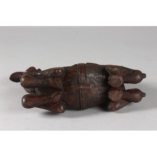 106 - A FINELY CARVED 19TH CENTURY INDIAN WOODEN CAMEL, 20cm long.