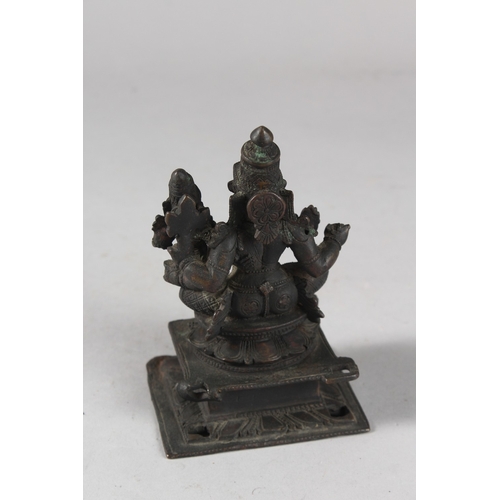 108 - A FINE 18TH-19TH CENTURY SOUTH INDIAN BRONZE FIGURE OF A DEITY, with consort, 12.5cm high.