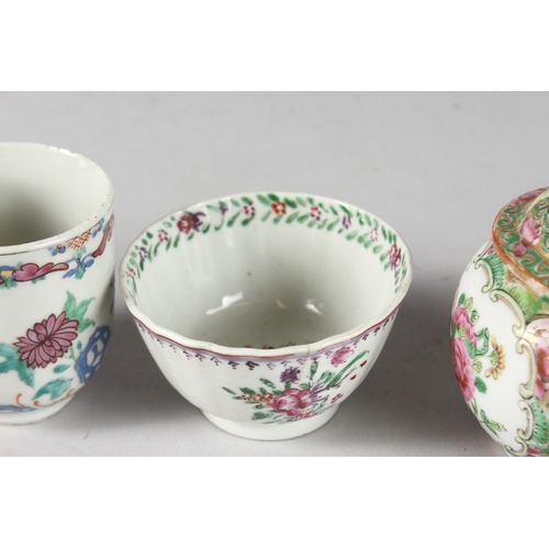 11 - A CHINESE CANTON FAMILLE ROSE PORCELAIN LIDDED POT, together with two porcelain cups, (3).