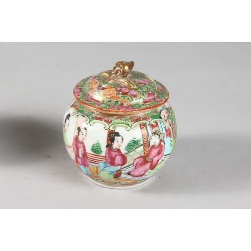 11 - A CHINESE CANTON FAMILLE ROSE PORCELAIN LIDDED POT, together with two porcelain cups, (3).