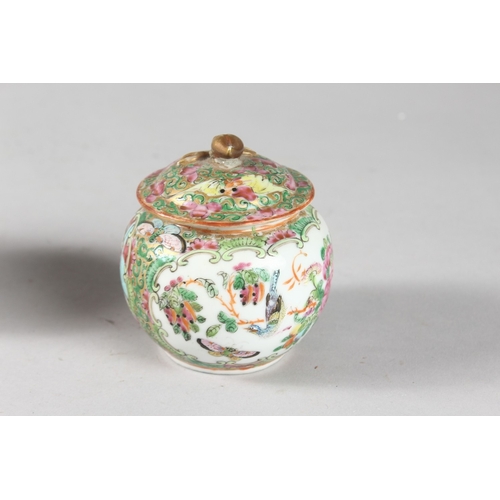 11 - A CHINESE CANTON FAMILLE ROSE PORCELAIN LIDDED POT, together with two porcelain cups, (3).