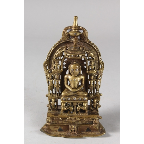 111 - A RARE 17TH CENTURY OR EARLIER SOUTH INDIAN SILVER INLAID BRONZE JAIN SHRINE, with engraved inscript... 