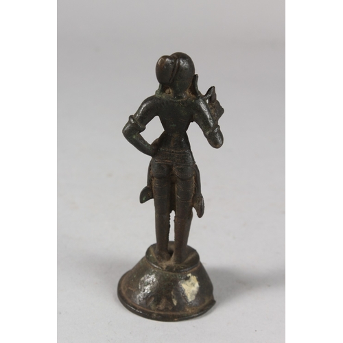 113 - A FINE 17TH CENTURY SOUTH INDIAN BRONZE FIGURE OF A MALE DEITY, 13cm high.