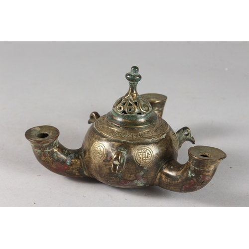 114 - A RARE AND UNUSUAL 12TH-13TH CENTURY PERSIAN SELJUK BRONZE TRIPLE SPOUTED OIL LAMP, with bird head t... 