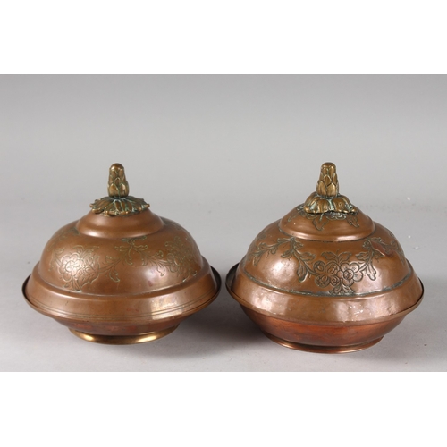 115 - A FINE PAIR OF 18TH CENTURY OTTOMAN TURKISH GILT COPPER TOMBAK LIDDED DISHES, the interior with fine... 