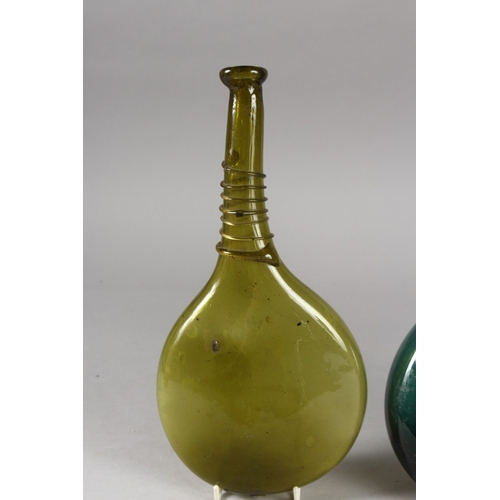 126 - TWO 17TH-18TH CENTURY PERSIAN SAFAVID GLASS SADDLE FLASKS, tallest 28cm high, (2).