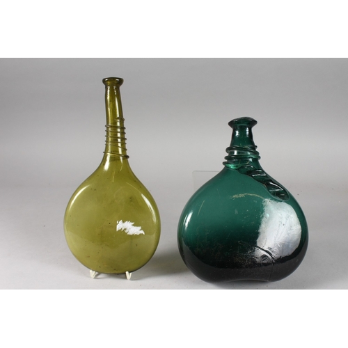 126 - TWO 17TH-18TH CENTURY PERSIAN SAFAVID GLASS SADDLE FLASKS, tallest 28cm high, (2).