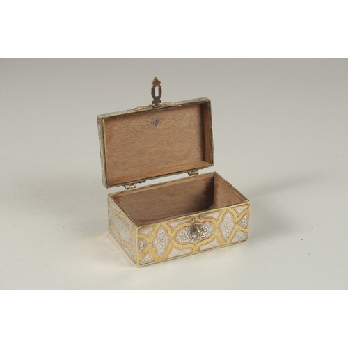 150 - A FINE 19TH CENTURY DAMASCUS SILVER AND COPPER INLAID BRASS BOX, 10cm across.